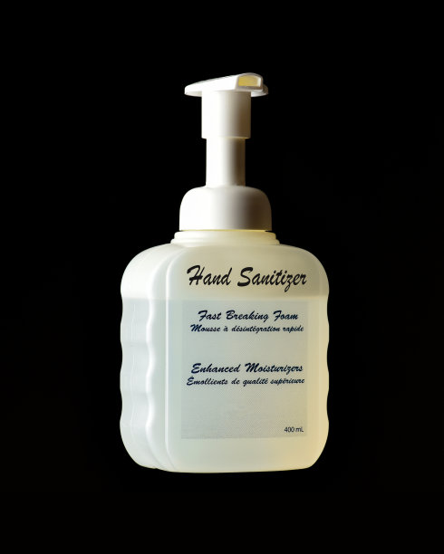 洗手液瓶子上的黑色背景图片下载