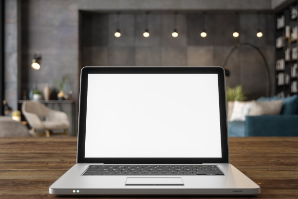 桌子上的笔记本电脑，散焦客厅图片下载