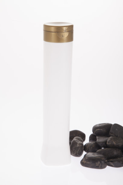 白色多用途塑料容器，金色盖子。图片下载