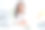 美丽的医生照片严肃的女士现代科技笔记本在桌子上说话电话咨询客户穿着白色的实验室大褂衬衫坐在椅子办公室诊所室内图片下载