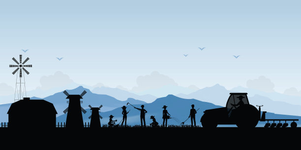 农民驾驶拖拉机在农田上的剪影。图片下载