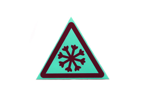 警告标志雪花在一个浅绿色的三角形在白色的背景孤立图片下载