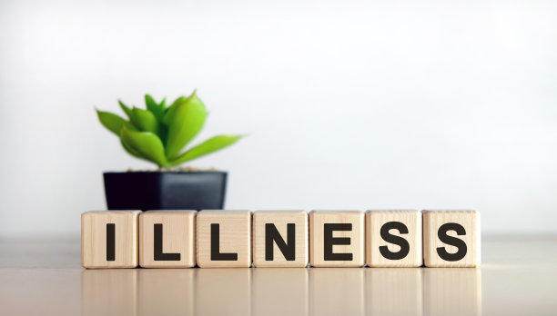 疾病-在白色背景上的医学概念。木块和花盆里的花。图片下载