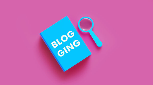 书的博客旁边的蓝色放大镜坐在粉红色的背景图片下载