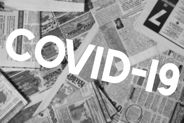 2019冠状病毒病标语跨越报纸模糊背景图片下载