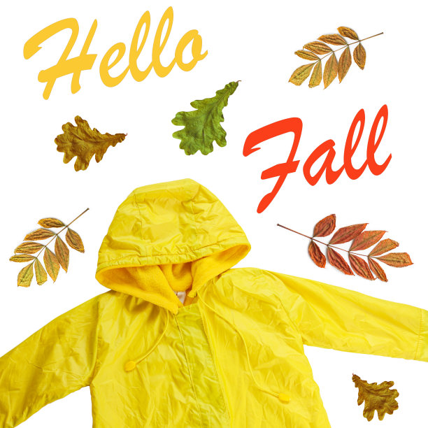 黄色雨衣在白色背景孤立。快乐有趣的孩子胜过秋天的风格的衣服。快乐下雨天概念图片下载