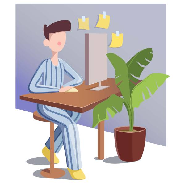 穿条纹睡衣的自由职业者坐在家中工作图片下载