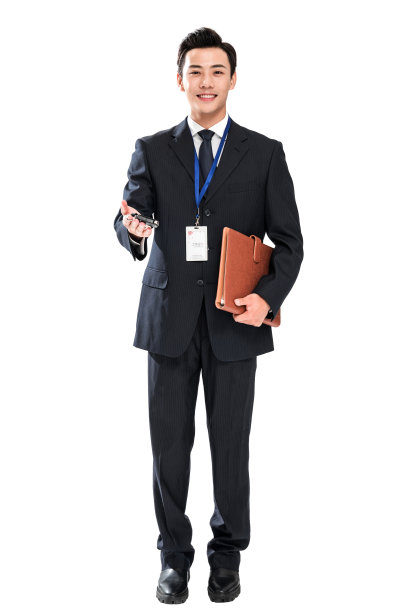 拿着汽车钥匙的青年销售人员图片下载