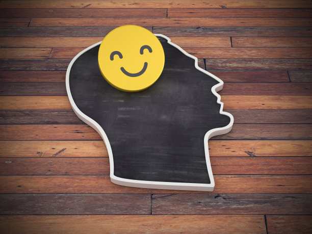 人的头部形状与快乐的表情在木地板- 3D渲染图片下载