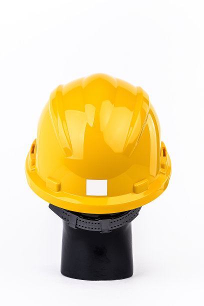 黄色施工头盔，保护施工人员、工程师和工人在施工区域的生命安全，并配有剪切路径和高品质照片图片下载