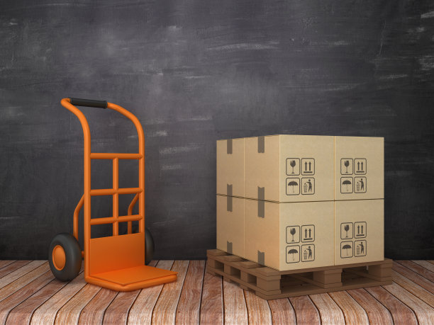 手动卡车和纸板盒在黑板上- 3D渲染图片下载