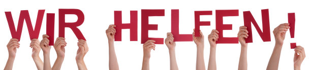 人们手握单词Wir Helfen意味着我们帮助，孤立的背景图片下载