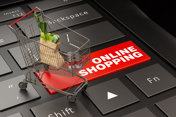 网上购物概念与笔记本电脑和市场手推车图片下载
