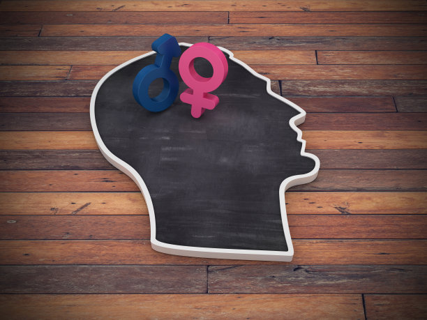 人类头部形状与性别符号在木地板- 3D渲染图片下载