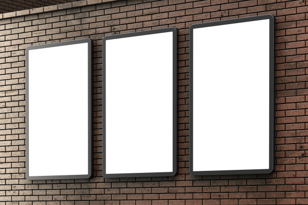 棕色砖墙上的空白灯箱组或街道液晶面板图片下载