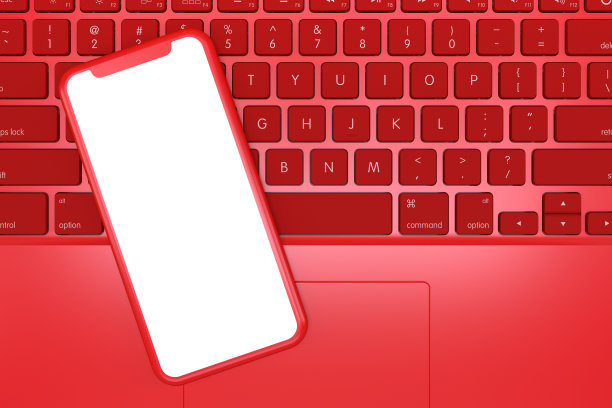 智能手机在笔记本电脑，最小的技术概念图片下载