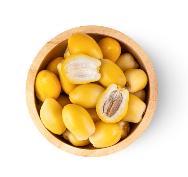 枣椰树在木碗孤立在白色的背景。俯视图图片下载