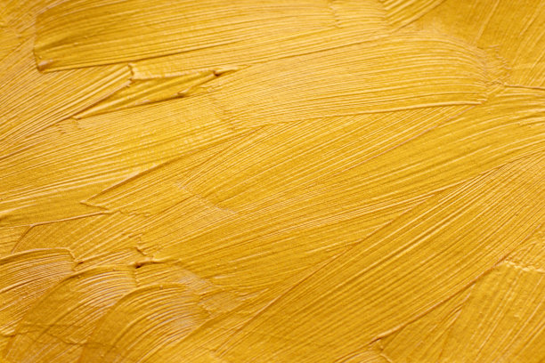抽象的金色油漆笔触纹理背景图片下载