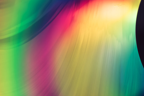 特写美丽抽象多色彩虹全息背景图案纹理设计。图片下载