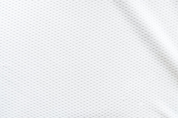 选择性聚焦，白色网格织物背景。运动面料运动服。重量轻，气流好，凉爽，易出汗干燥。带有文本复制空间的抽象墙纸。图片下载