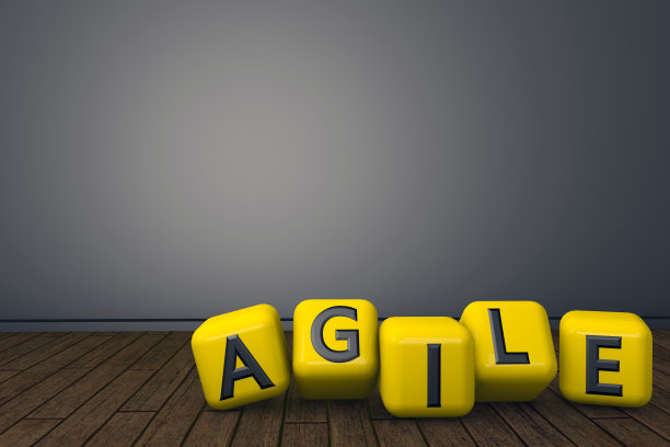 “AGILE”单词的黄色立方体的3d渲染。图片下载