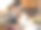 一个年轻女子在家里的厨房里烤香蕉面包，然后切黄油加入面糊。图片下载