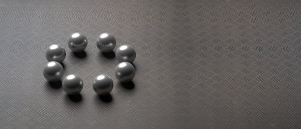 八个黑色光泽球在金属板地板背景上。三维演示图片下载