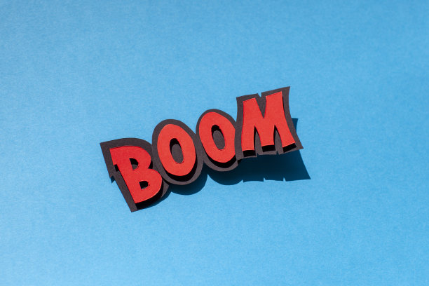 蓝色背景的纸上喜剧演讲泡泡。繁荣。图片下载