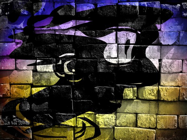 虚拟涂鸦。色彩斑斓的画面，画在一堵砖墙的照片上。一个戴着头饰的大眼睛的有趣的年轻人惊讶地盯着什么东西。图片下载