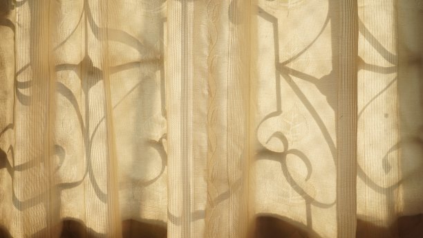 阳光透过窗帘。抽象背景的想法图片下载