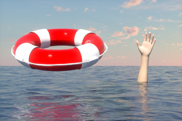 用救生圈救落水者，救援概念。图片下载