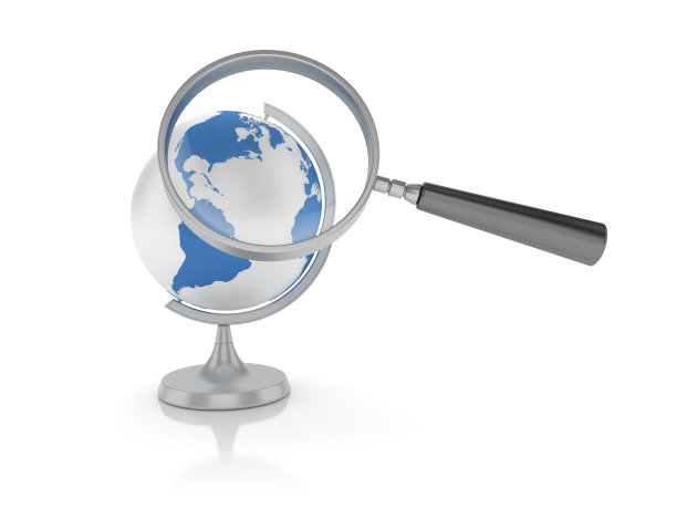 放大镜与桌面地球仪- 3D渲染图片下载