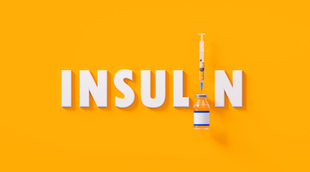 黄色背景上的胰岛素注射器和胰岛素瓶旁边图片下载