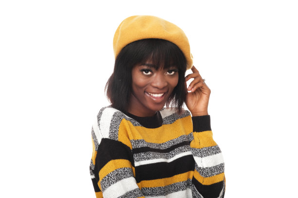 时髦的黑色样式的毛衣与条纹和黄色帽子。图片下载