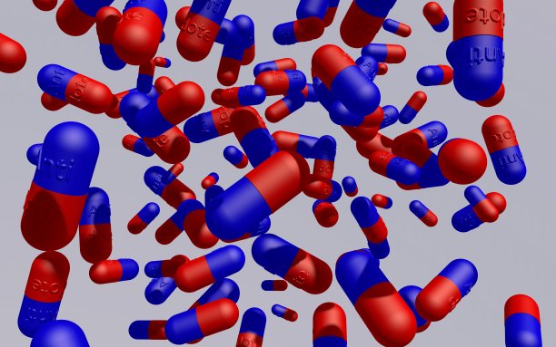 刻着“解毒剂”字样的红蓝色胶囊在空中碎裂图片下载