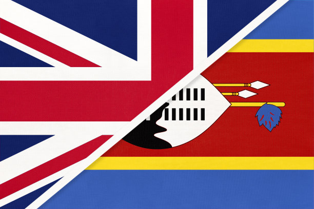 英国vs斯瓦蒂尼的纺织品国旗。两个欧洲和非洲国家之间的关系。图片下载