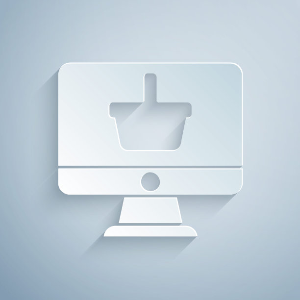 电脑显示器与购物篮图标孤立在灰色背景。在线购物车。超市篮的象征。纸艺术风格。矢量图素材图片