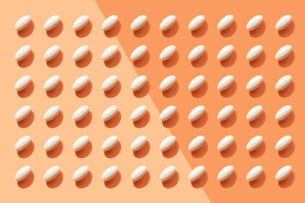 重复药丸，橙色背景图片下载