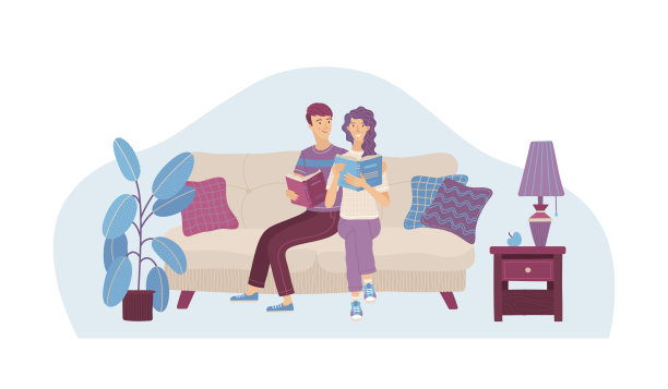 一对情侣在沙发上看书图片下载