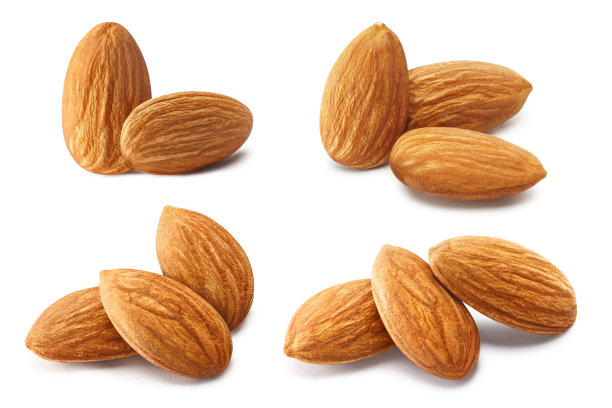 收集杏仁堆在白色图片下载