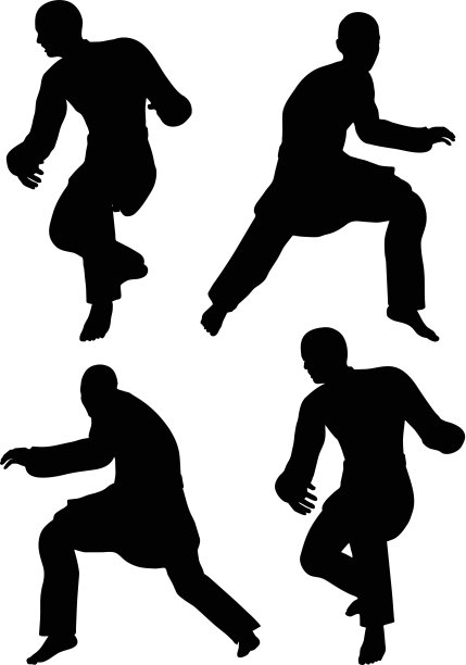 空手道武术剪影的男人在潜行姿势图片下载