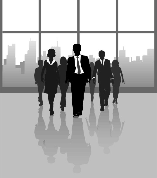 商务人士走过城市建筑的窗户图片下载