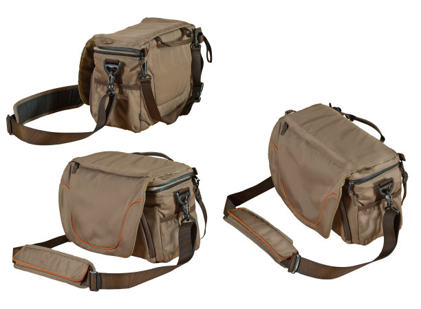 旅行背包孤立在一个白色的背景。绿色包特写镜头。橄榄袋摄影器材。图片下载