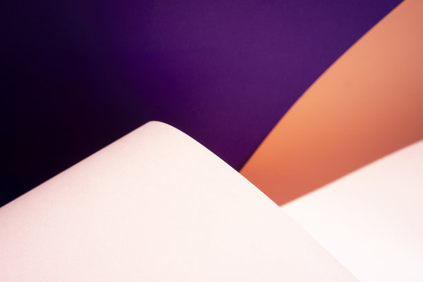 多色曲面纸背景。艺术创意背景摄影。图片下载