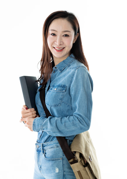 兴高采烈的学生拿着白色背景的书图片下载