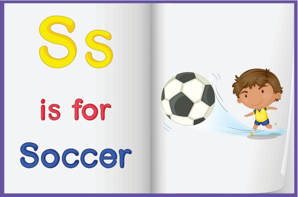 一个孩子踢足球的照片在一本书里图片下载