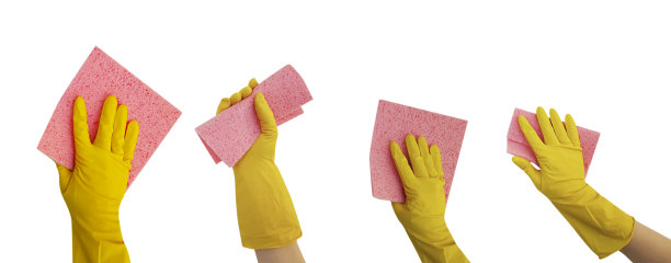 手戴黄色手套，以清洁抹布隔离图片下载