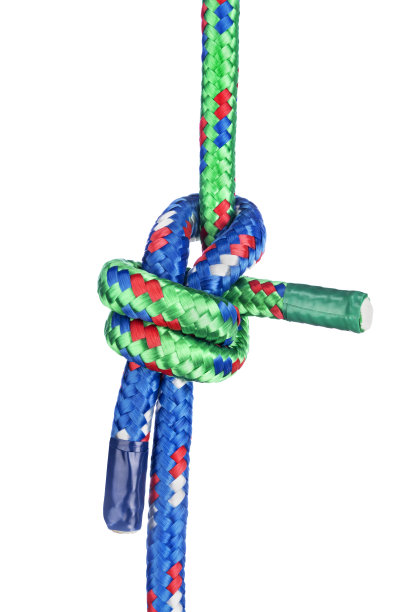 床单弯曲结在白色图片下载