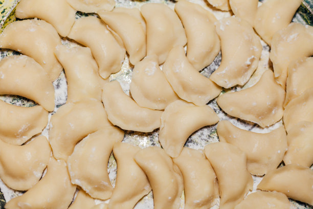 许多美味的饺子为烹饪背景图片下载