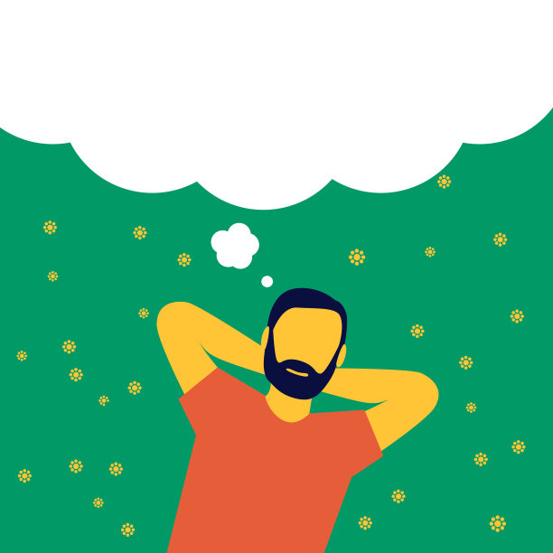 放松的男人躺在草地上做梦。素材图片